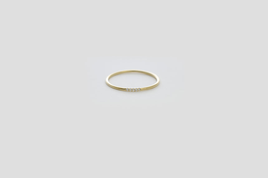 Dainty Ring with Five Diamonds